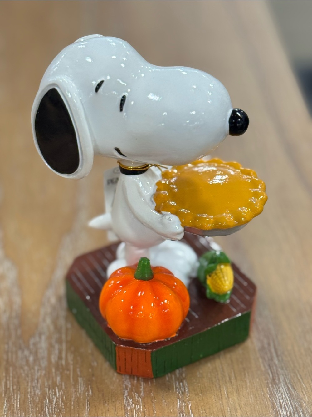 White Snoopy Figurine with Orange Pumpkin Pie Seasonal Accent